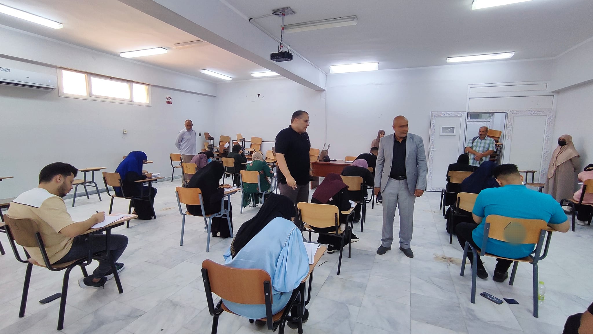 General Registrar of Sabratha University, accompanied by the Director of the Study and Examinations Office in the General Registrar’s Department
